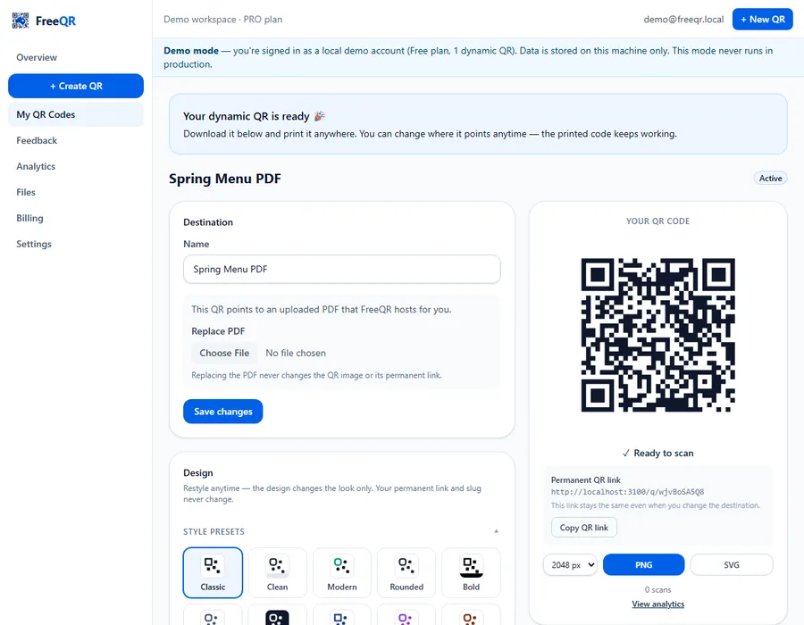 The FreeQR QR detail page for a hosted PDF, showing a 'Your dynamic QR is ready' message and a Replace PDF option that keeps the same QR image and link